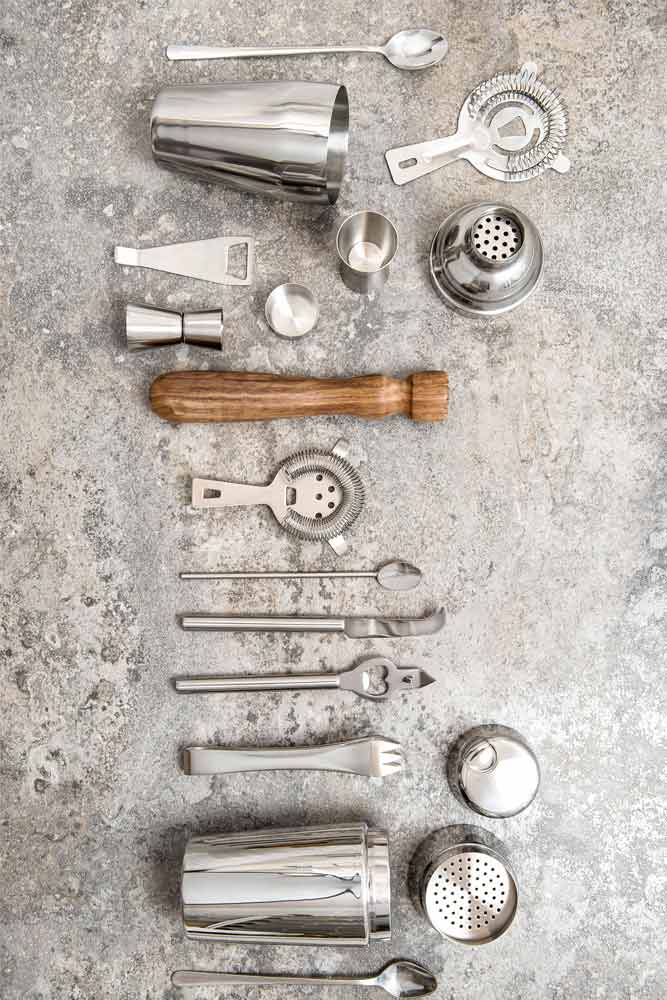 Spirits, bar tools and shakers flat lay
